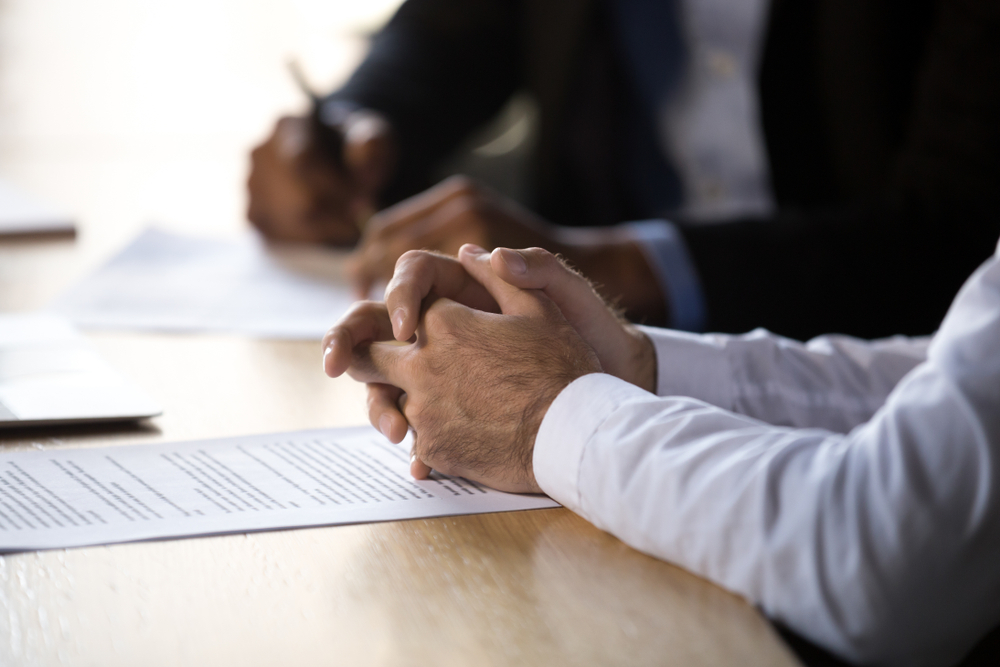 Attorney with a Client Photo of an Attorney with a Client