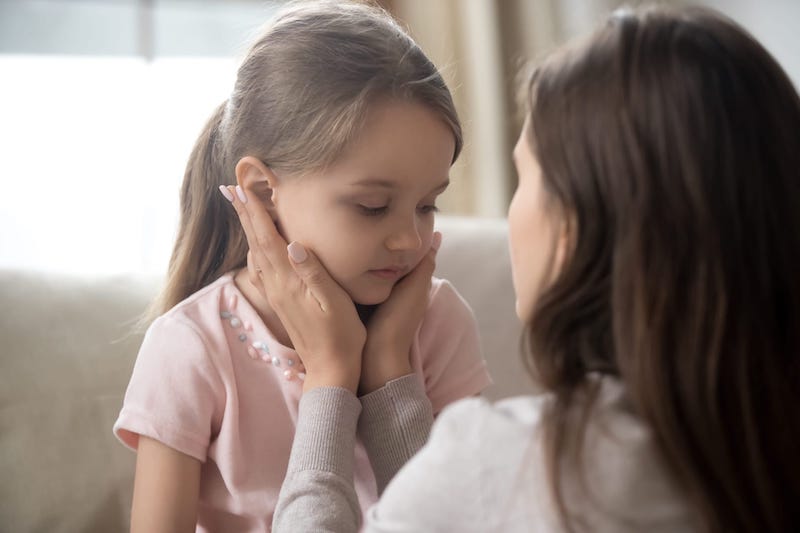 Upset Child Mother Comforting Her Sad Daughter
