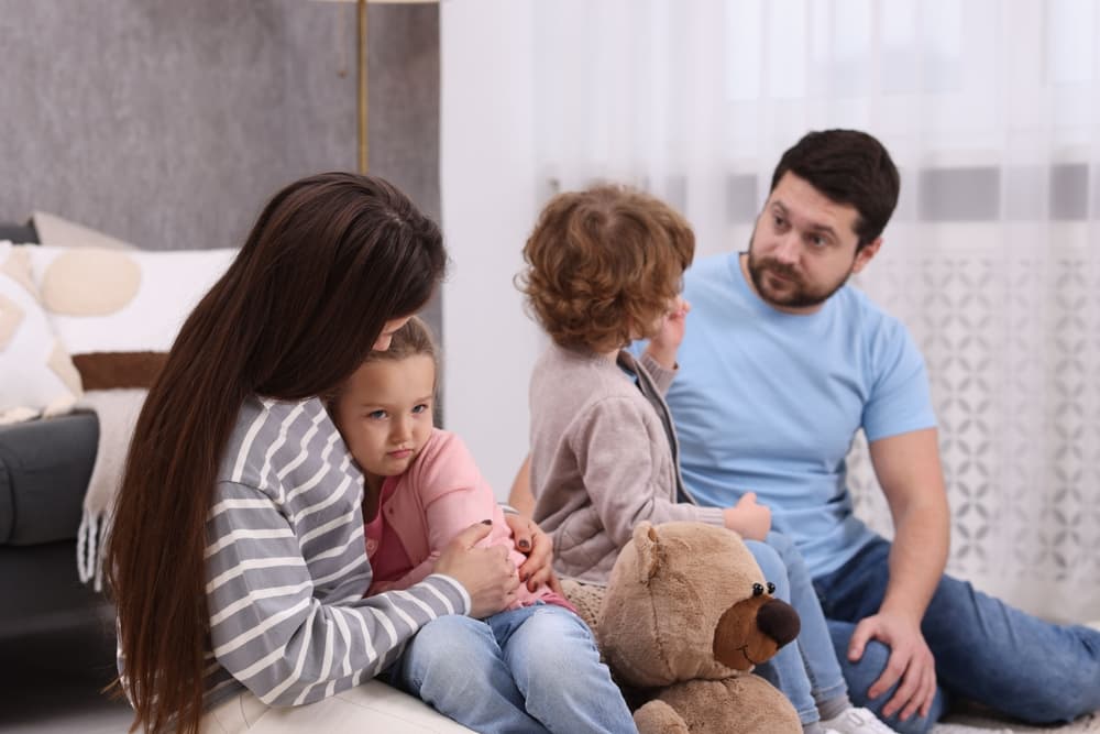 Resentful little kids and their parents arguing at home